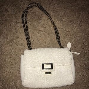 Charming white cross body purse